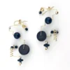 Modernist geometric dangle earrings in gold filled wire with black glass beads sculptural design