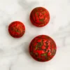 Three bold Czech glass beads with Egyptian Revival motifs—small, sculptural, and full of 1920s character.