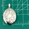 large sterling silver oval locket engraved floral cartouche vintage hayward weh