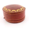 Antique Cartier leather jewelry presentation box with gilded garland border and silk velvet interior