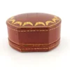 Antique Cartier leather jewelry presentation box with gilded garland border and silk velvet interior