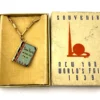 1939 New York Worlds Fair bracelet with miniature book charm souvenir album in original box