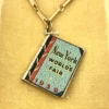 1939 New York Worlds Fair bracelet with miniature book charm souvenir album in original box