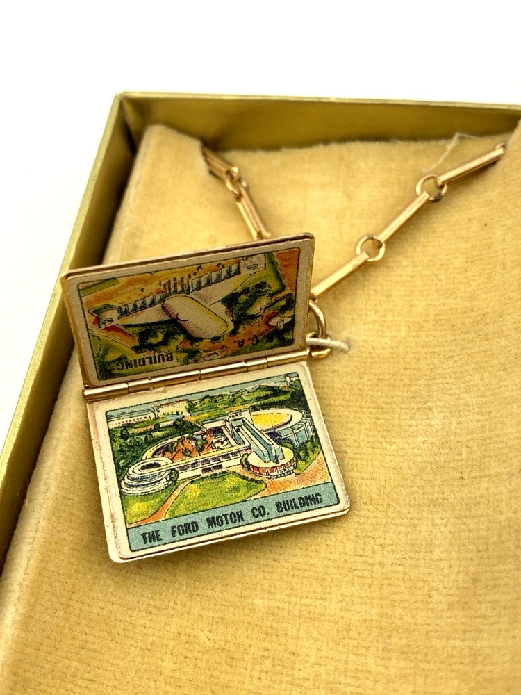 1939 New York Worlds Fair bracelet with miniature book charm souvenir album in original box