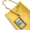 1939 New York Worlds Fair bracelet with miniature book charm souvenir album in original box