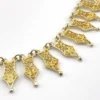 Vintage filigree link necklace with gold and silver tone spear shaped links 17 inch