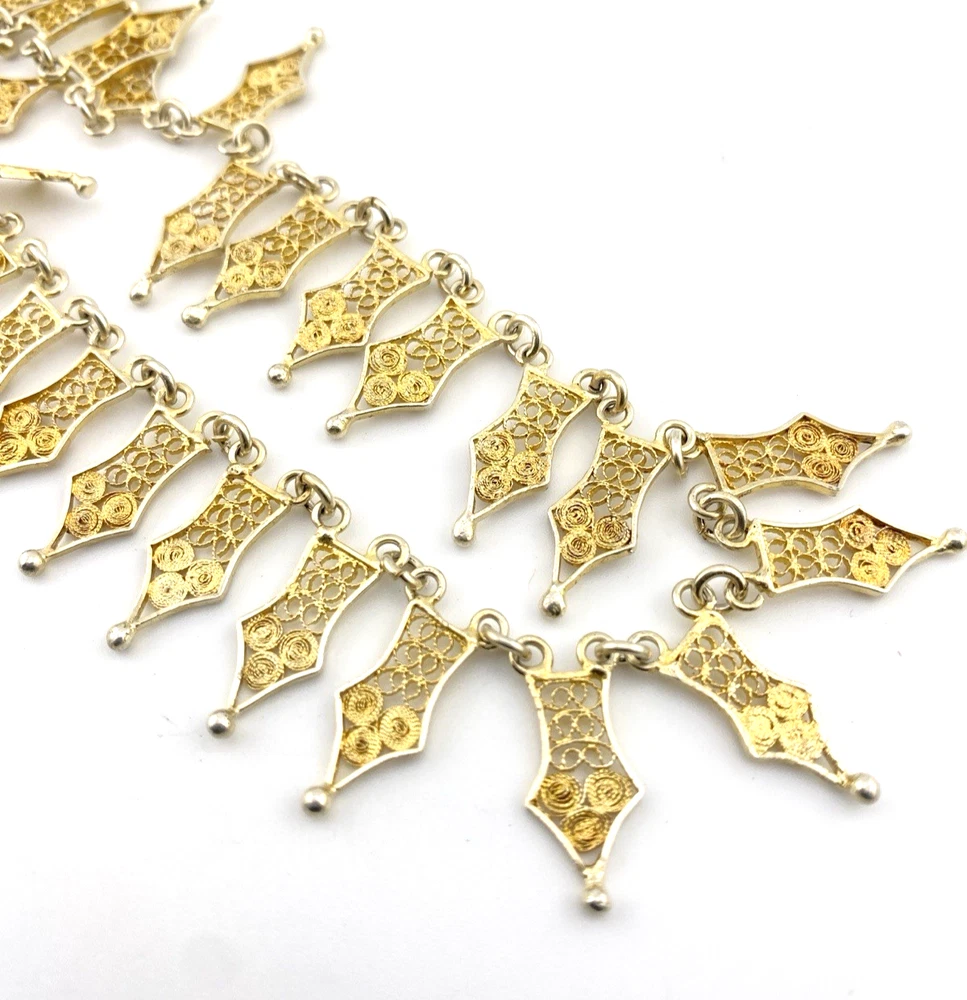 Vintage filigree link necklace with gold and silver tone spear shaped links 17 inch