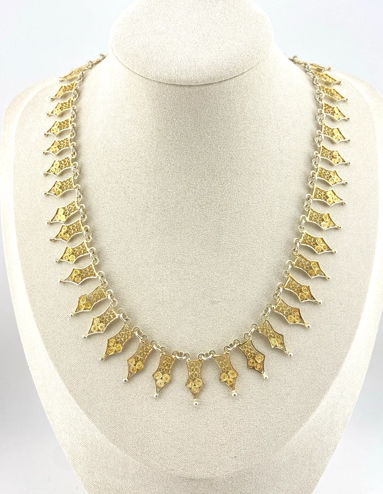 Vintage filigree link necklace with gold and silver tone spear shaped links 17 inch