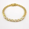Gold over sterling silver bracelet with cubic zirconia stones panther link design 7 inch
