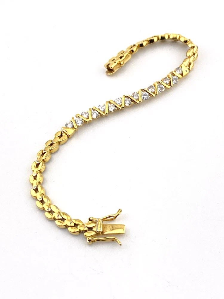 Gold over sterling silver bracelet with cubic zirconia stones panther link design 7 inch