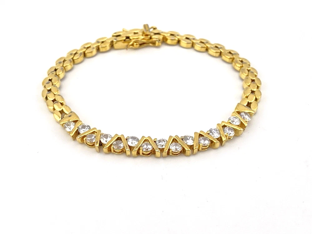 Gold over sterling silver bracelet with cubic zirconia stones panther link design 7 inch