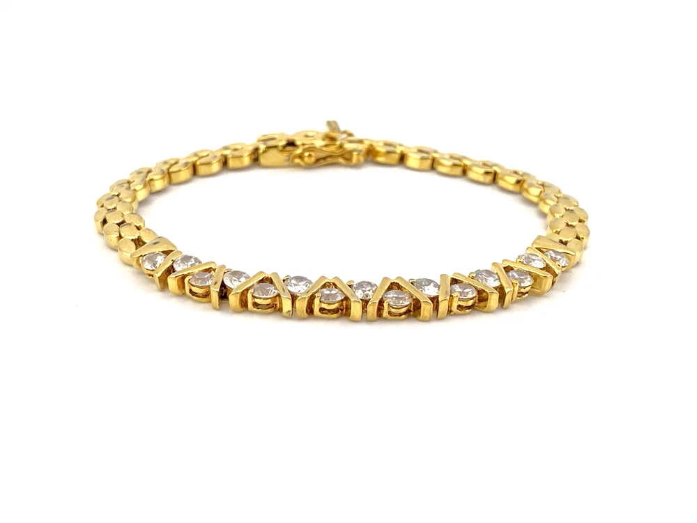 Gold over sterling silver bracelet with cubic zirconia stones panther link design 7 inch