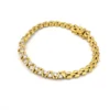 Gold over sterling silver bracelet with cubic zirconia stones panther link design 7 inch