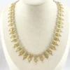 Vintage filigree link necklace with gold and silver tone spear shaped links 17 inch