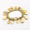 Vintage gold filled charm bracelet with fifteen locket charms including hearts book and enamel designs