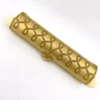 Vintage Speidel Golden Chord watch band box with textured beige plastic and gold accents from the 1950s