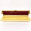Vintage Speidel Golden Chord watch band box with textured beige plastic and gold accents from the 1950s