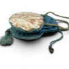 Antique Art Nouveau era mother-of-pearl and blue silk necessaire purse with scalloped shell panels, rope handles, and tassel.
