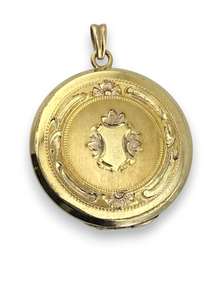 Antique Hayward 1/20 12K gold filled round photo locket with chased shield cover, floral garland, pinstripe back, and interior photo frames