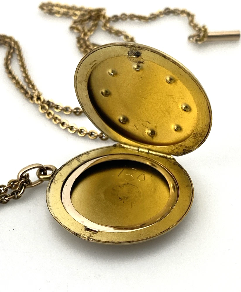 Antique Victorian gold filled round locket necklace with paste stone edging, bloomed gold finish, engraved EM monogram, and 21 inch chain