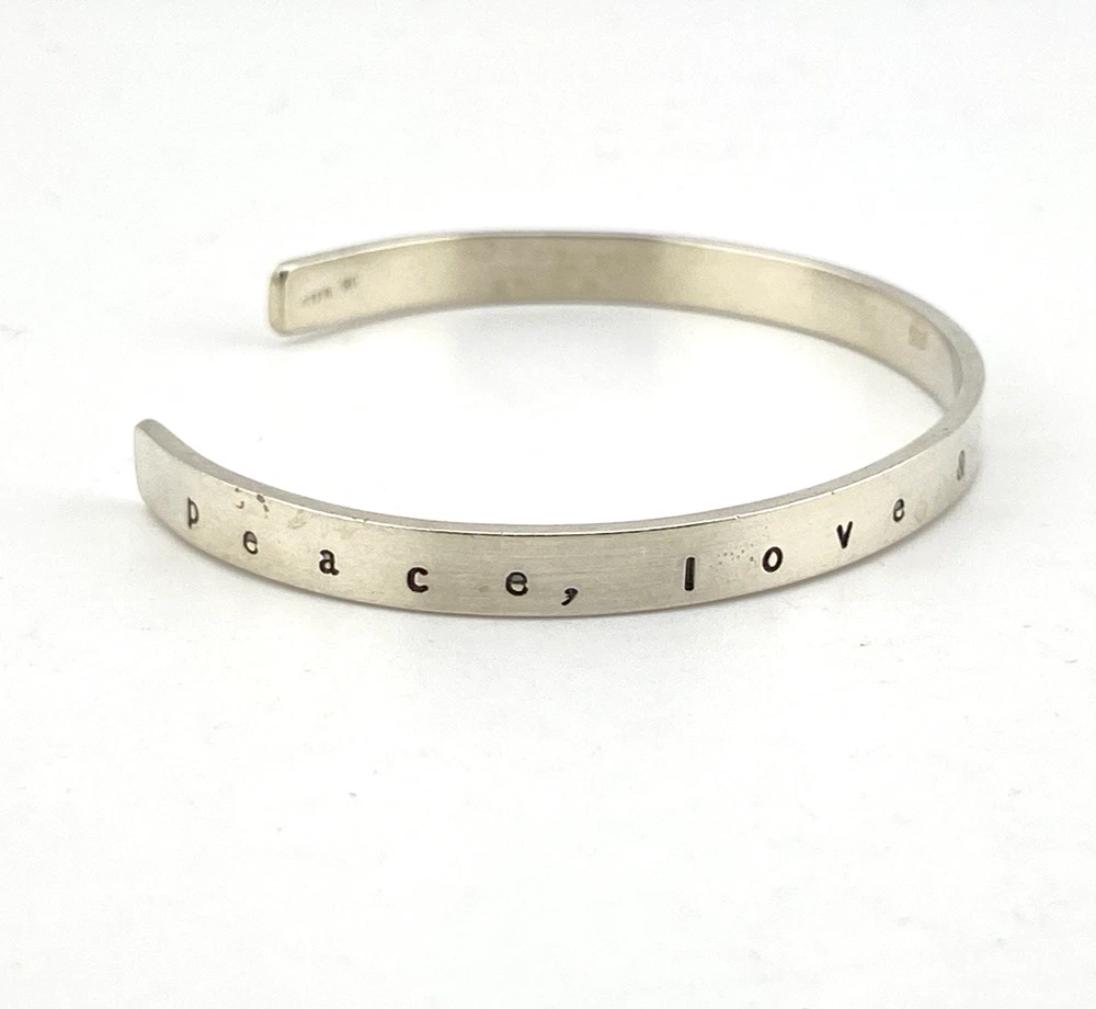 Aquabeet sterling silver cuff bracelet stamped with Peace Love & Understanding.