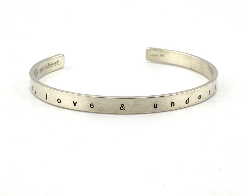 Aquabeet sterling silver cuff bracelet stamped with Peace Love & Understanding.