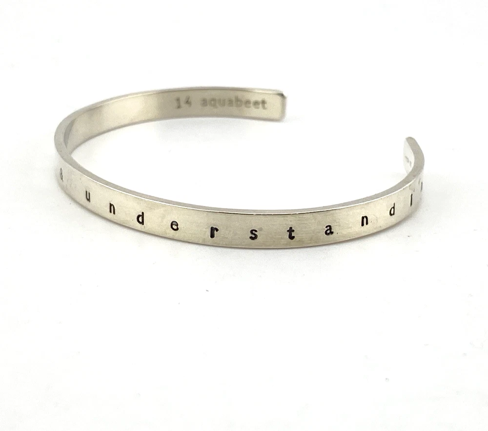 Aquabeet sterling silver cuff bracelet stamped with Peace Love & Understanding.