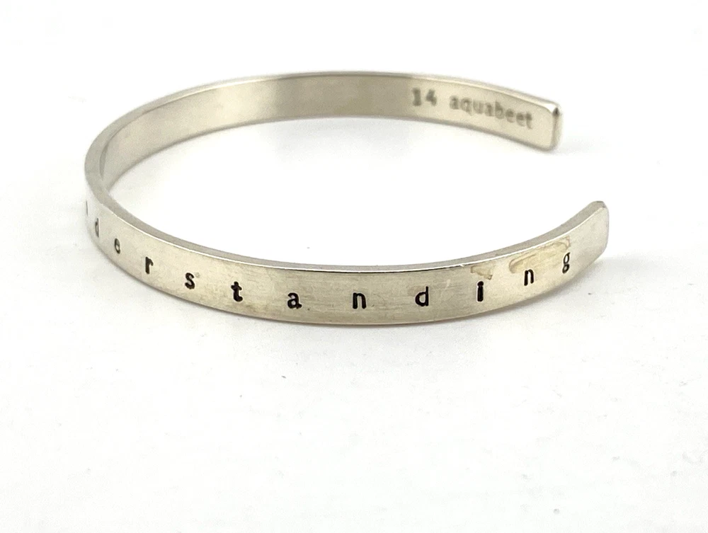 Aquabeet sterling silver cuff bracelet stamped with Peace Love & Understanding.