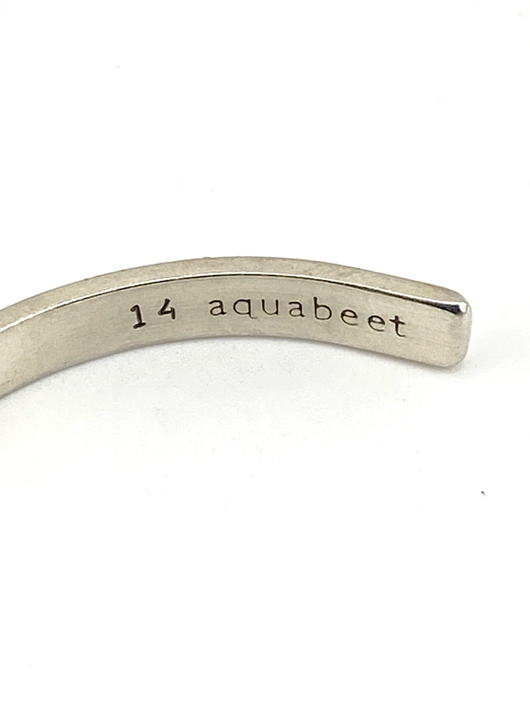 Aquabeet sterling silver cuff bracelet stamped with Peace Love & Understanding.