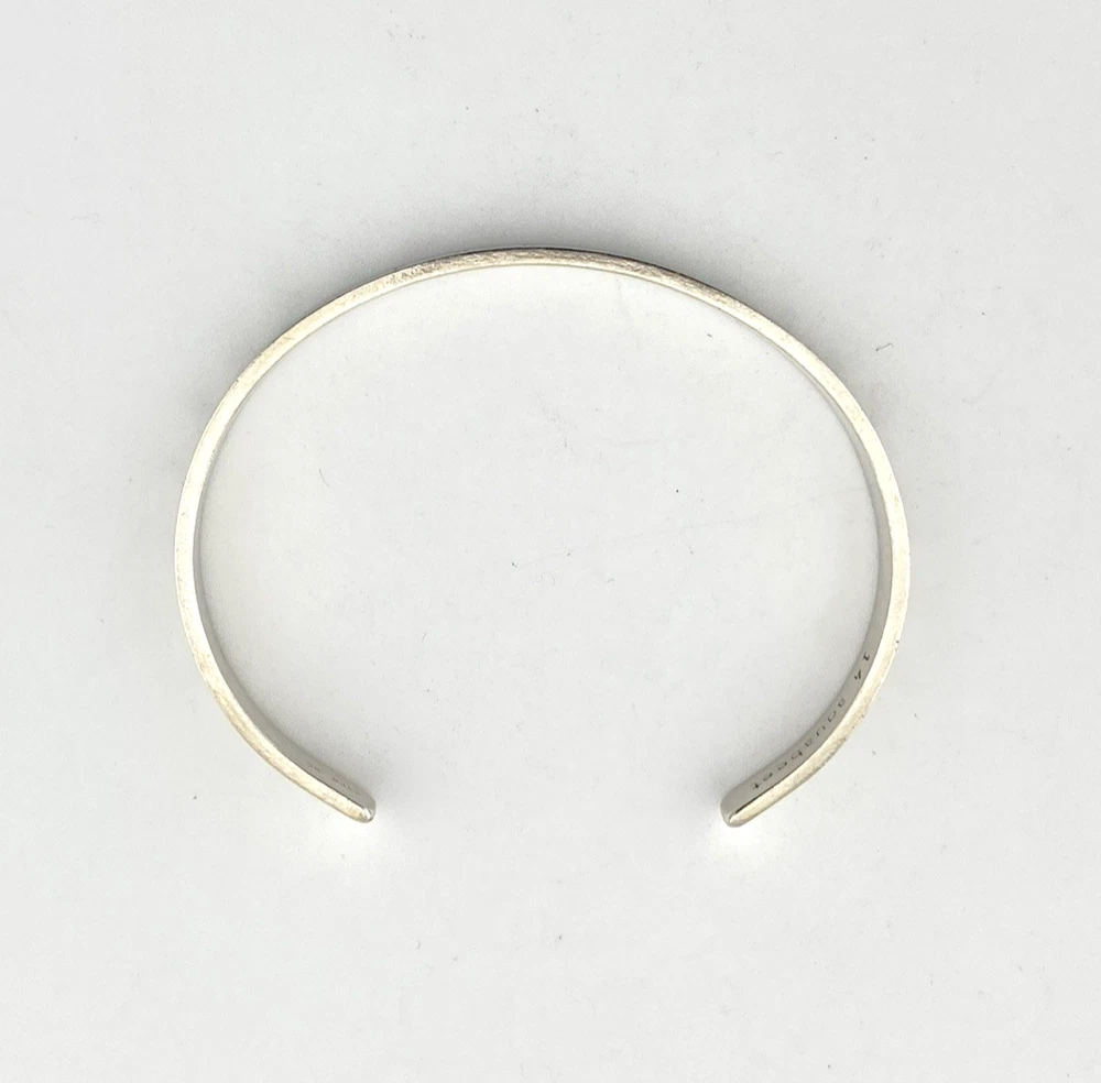 Aquabeet sterling silver cuff bracelet stamped with Peace Love & Understanding.