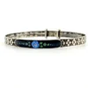 Art Deco JHP sterling silver child’s size bangle bracelet with champlevé enamel blue flower center and geometric textured band