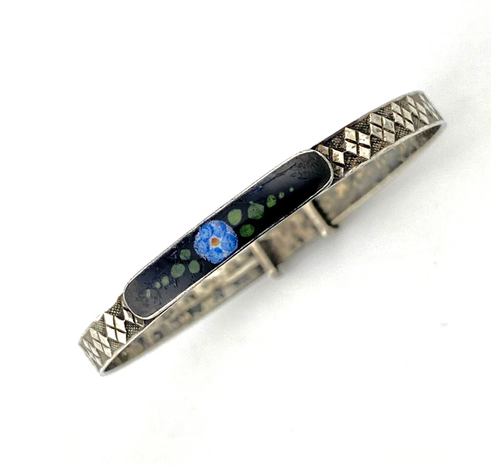 Art Deco JHP sterling silver child’s size bangle bracelet with champlevé enamel blue flower center and geometric textured band
