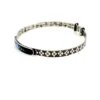 Art Deco JHP sterling silver child’s size bangle bracelet with champlevé enamel blue flower center and geometric textured band