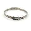 Art Deco JHP sterling silver child’s size bangle bracelet with champlevé enamel blue flower center and geometric textured band