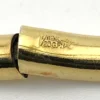 Ballou child’s size 1/20 12K gold filled hinged bangle bracelet with engraved parallel line texture and raised scrolled center