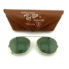 Vintage Bausch and Lomb Ray Ban Ray Lite clip on sunglasses with green lenses, gold tone frame, and original brown case