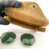 Vintage Bausch and Lomb Ray Ban Ray Lite clip on sunglasses with green lenses, gold tone frame, and original brown case case interior