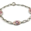 Child’s size 1940s sterling silver bracelet with pink guilloché enamel rose stations and squared oval links