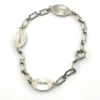 Child’s size 1940s sterling silver bracelet with pink guilloché enamel rose stations and squared oval links