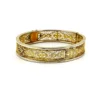 Second side view of Antique gold filled filigree clamper bracelet with hand carved shell cameo and hidden clasp