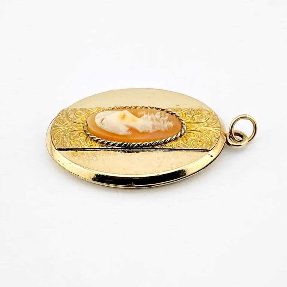 Edwardian gold filled Binder Bros oval locket with hand carved shell cameo and engraved center panel
