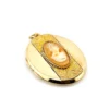 Edwardian gold filled Binder Bros oval locket with hand carved shell cameo and engraved center panel side view