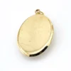 Edwardian gold filled Binder Bros oval locket with hand carved shell cameo and engraved center panel back cover