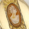 Edwardian gold filled Binder Bros oval locket with hand carved shell cameo and engraved center panel cameo detail