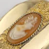 Edwardian gold filled Binder Bros oval locket with hand carved shell cameo and engraved center panel - cover detail