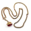 Gold filled repurposed pocket watch chain necklace with pink jeweled fob charm and mixed chain links