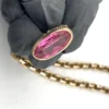 Gold filled repurposed pocket watch chain necklace with pink jeweled fob charm and mixed chain links