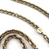 Gold filled repurposed pocket watch chain necklace with pink jeweled fob charm and mixed chain links