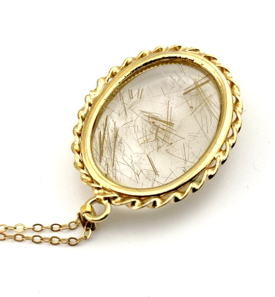 Gold rutilated quartz pendant necklace with oval cabochon and 12k rolled gold chain
8) Short Description