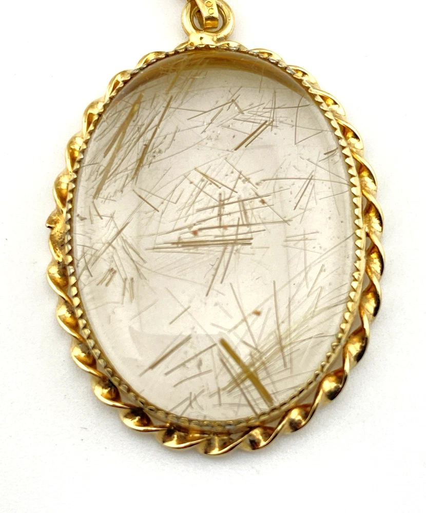 Gold rutilated quartz pendant necklace with oval cabochon and 12k rolled gold chain

8) Short Description